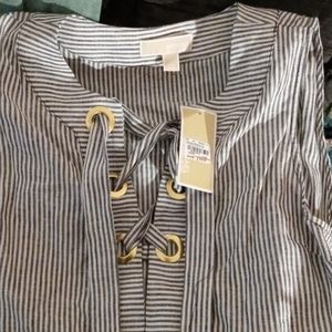 A womans work blouse by Michael Kors